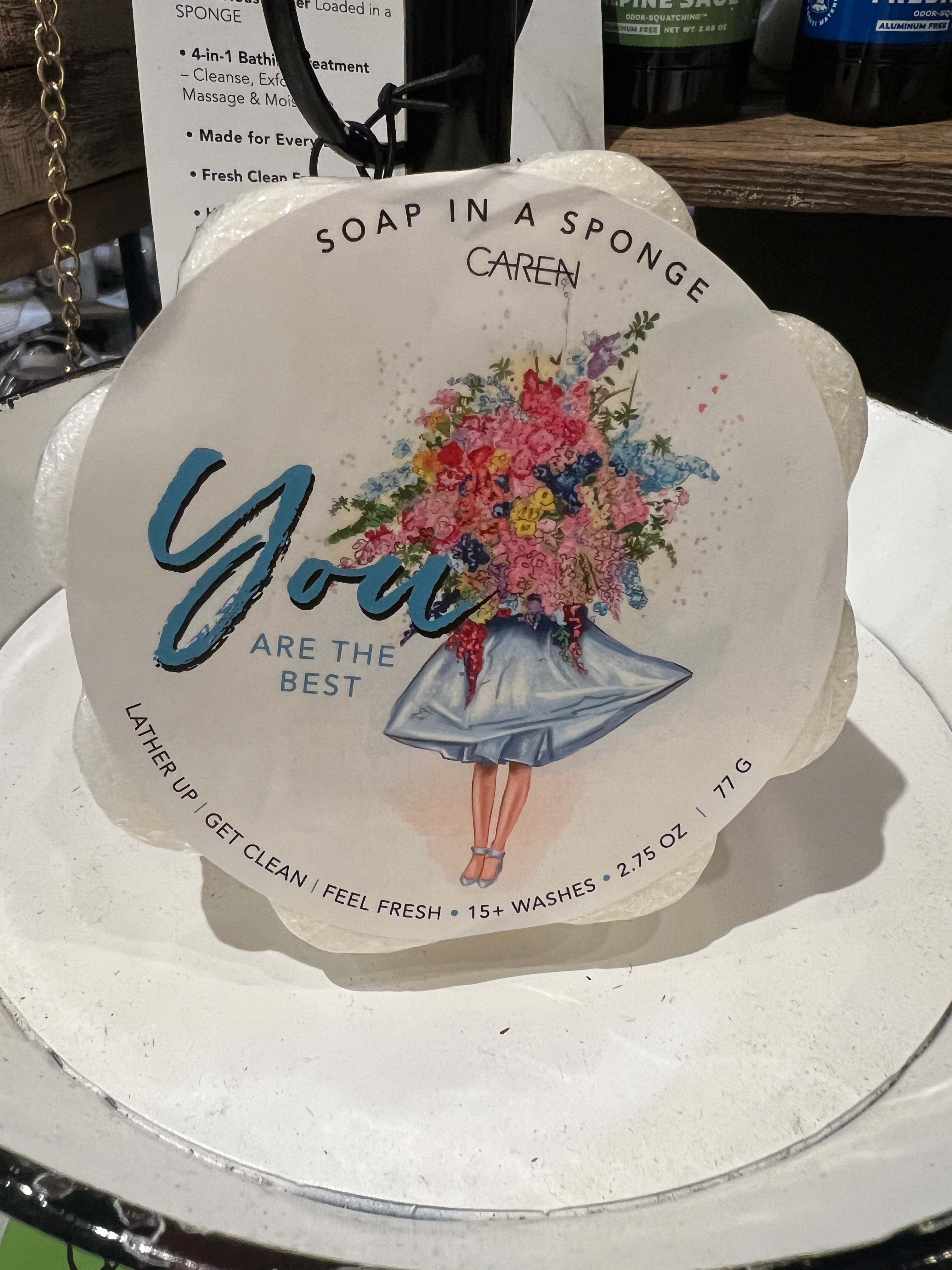 Caren "You Are The Best" Soap sponge shaped like a white flower.