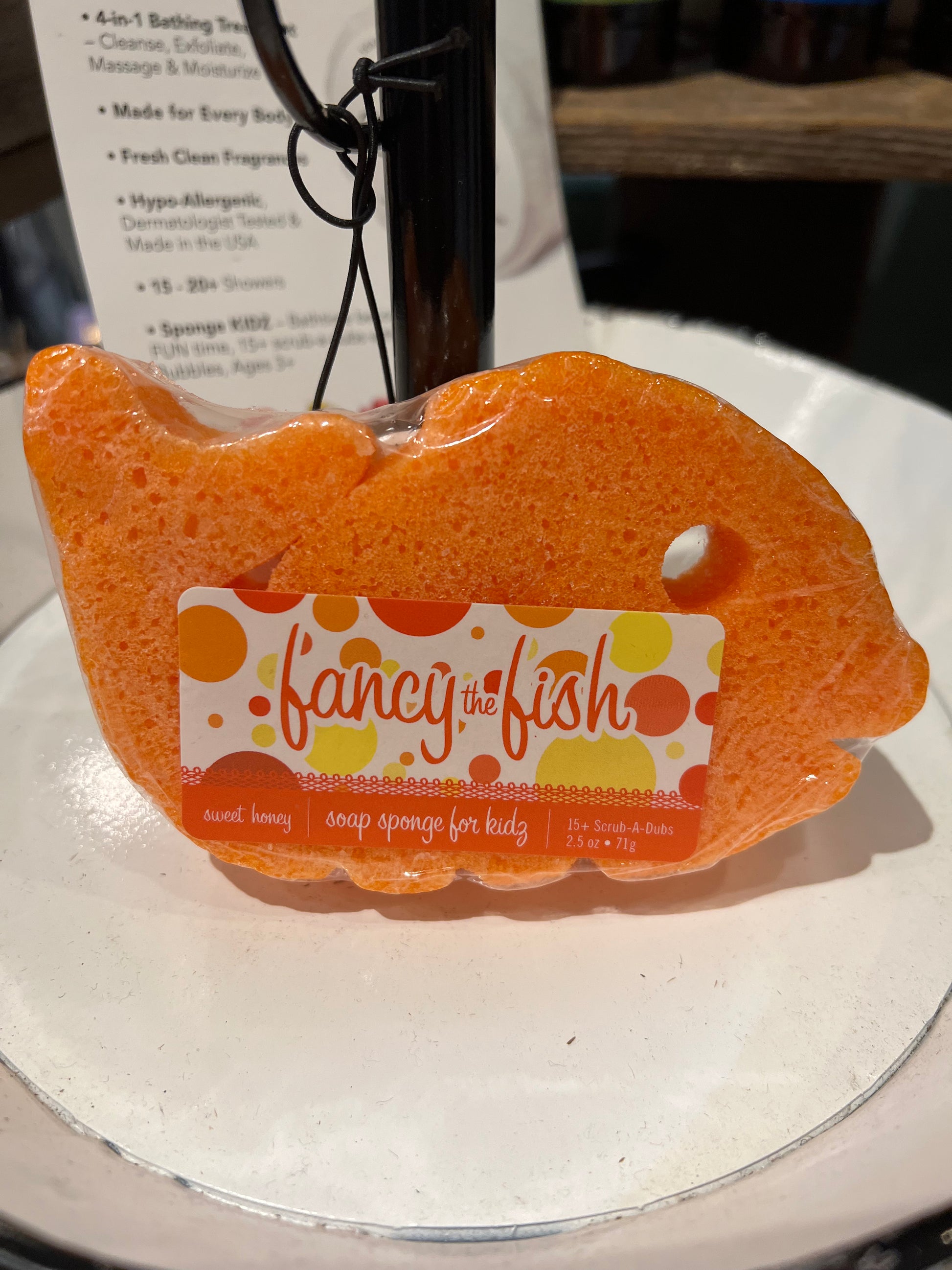 Caren "Fancy the Fish" soap sponge for kids shaped like an orange fish.