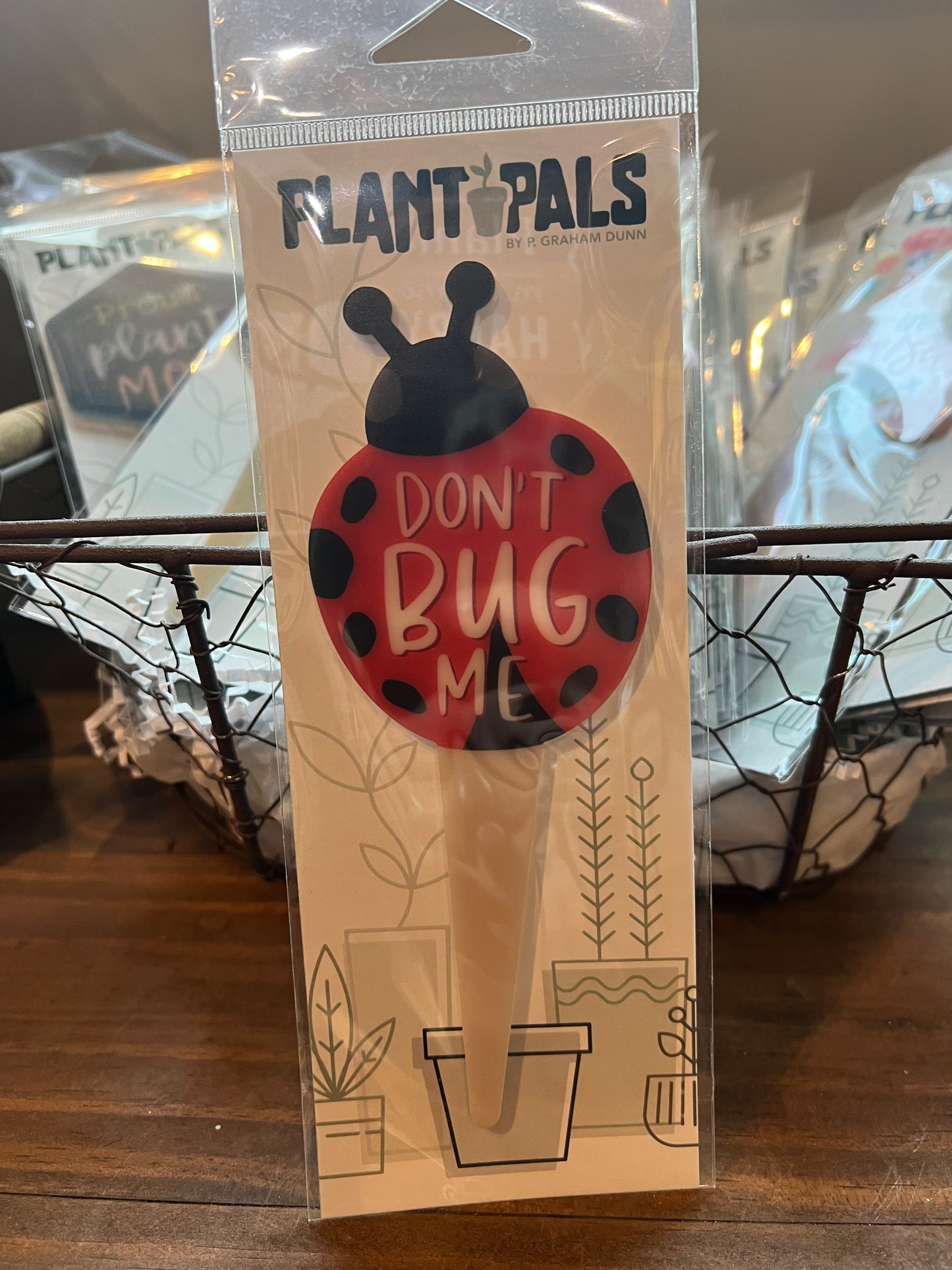 Ladybug "Don't Bug Me" plant pal sign.