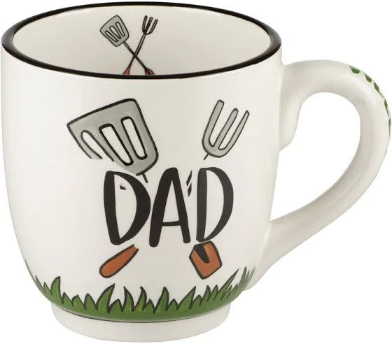 White handmade mug featuring "DAD" with grilling utensils.