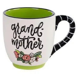 White handmade mug with black handle featuring "grand-mother" with flowers.