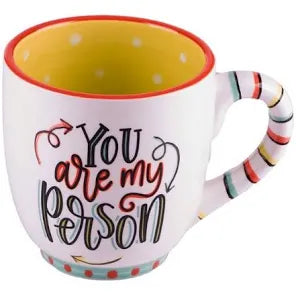 White handmade mug with a yellow inside, featuring "You' are my person".