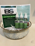 Spray bottle is clear with a green label featuring "BS".