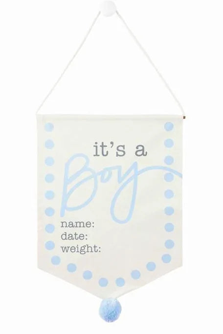 Blue and white door hanger displaying "it's a boy; name:; date:; weight:"
