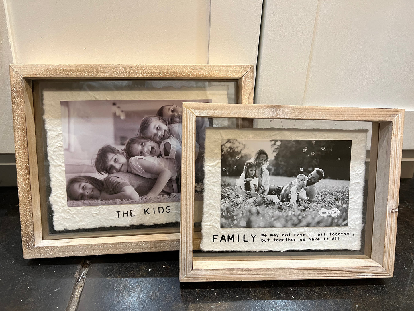 Assorted rustic wooden picture frames.