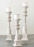 White-washed wood base with beaded details.