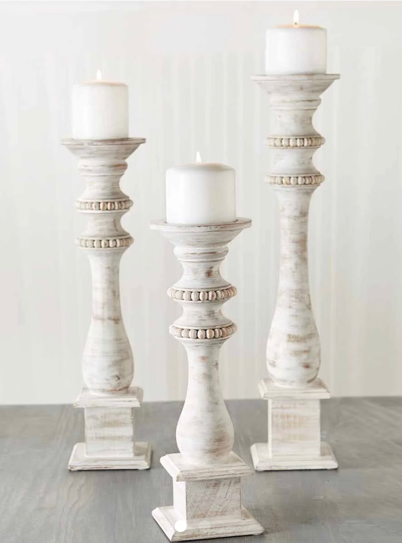 White-washed wood base with beaded details.