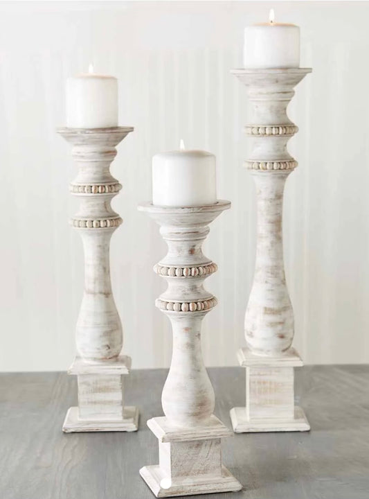 White-washed wood base with beaded details.