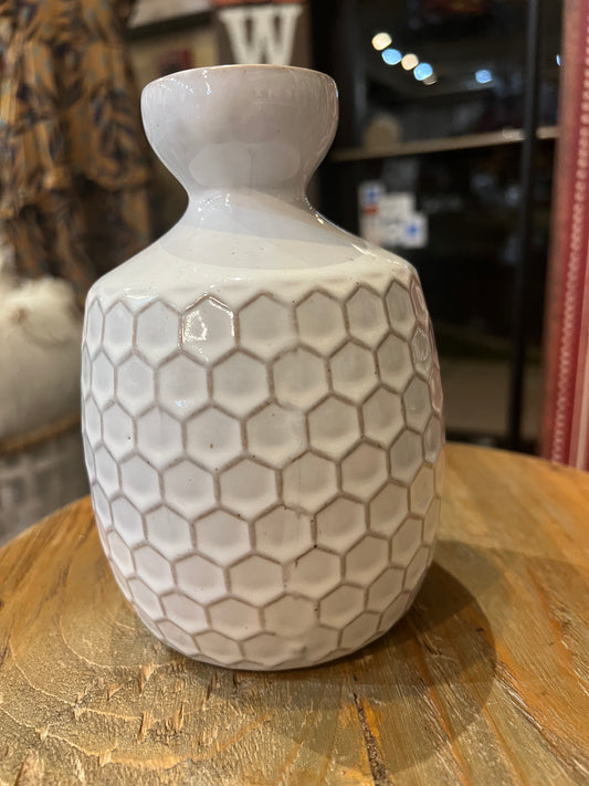 Glazed ceramic stoneware vase with honeycomb texture.