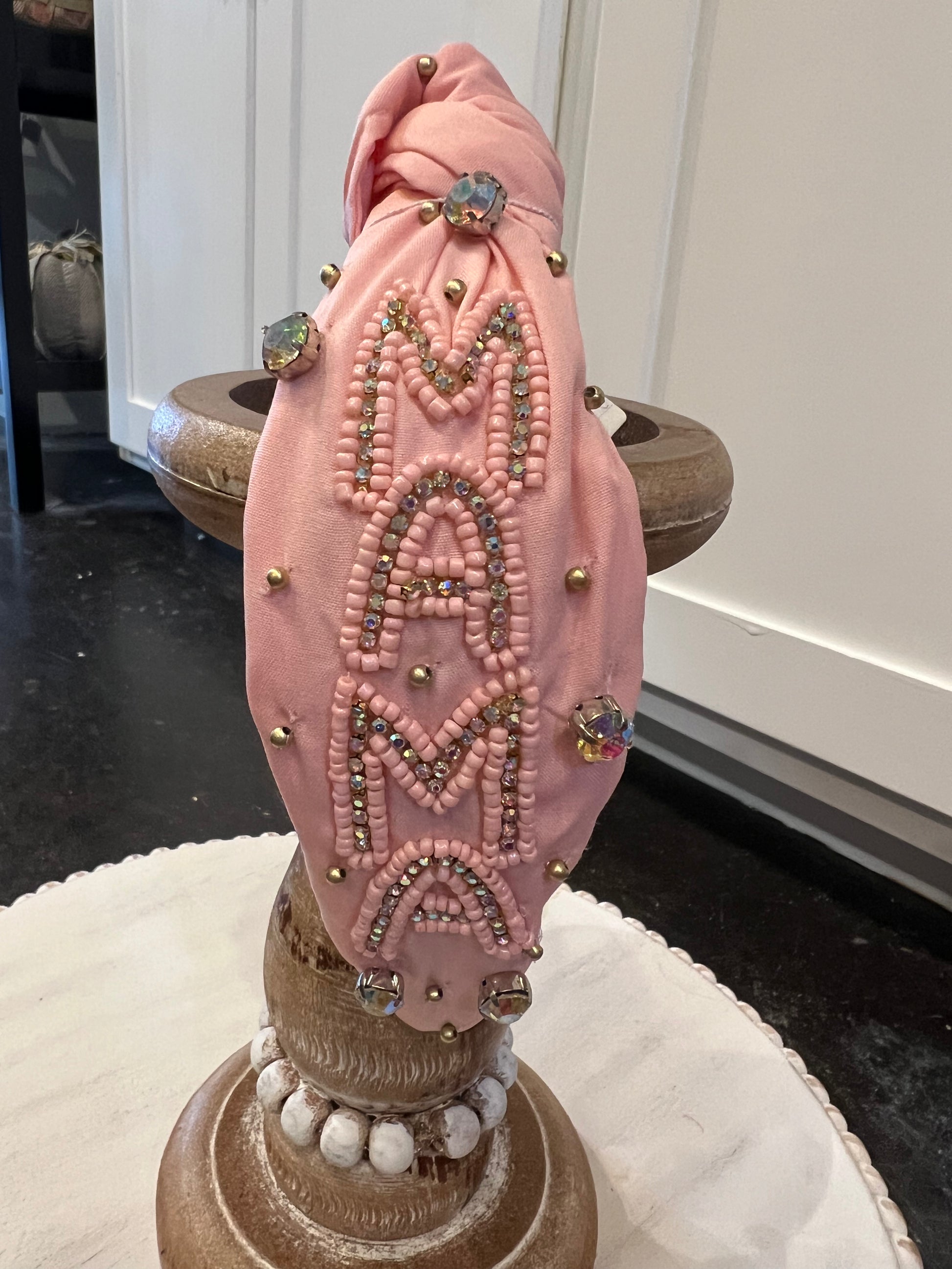 Light pink beaded rhinestone headband featuring "MAMA".