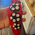 Red beaded soccer headband.