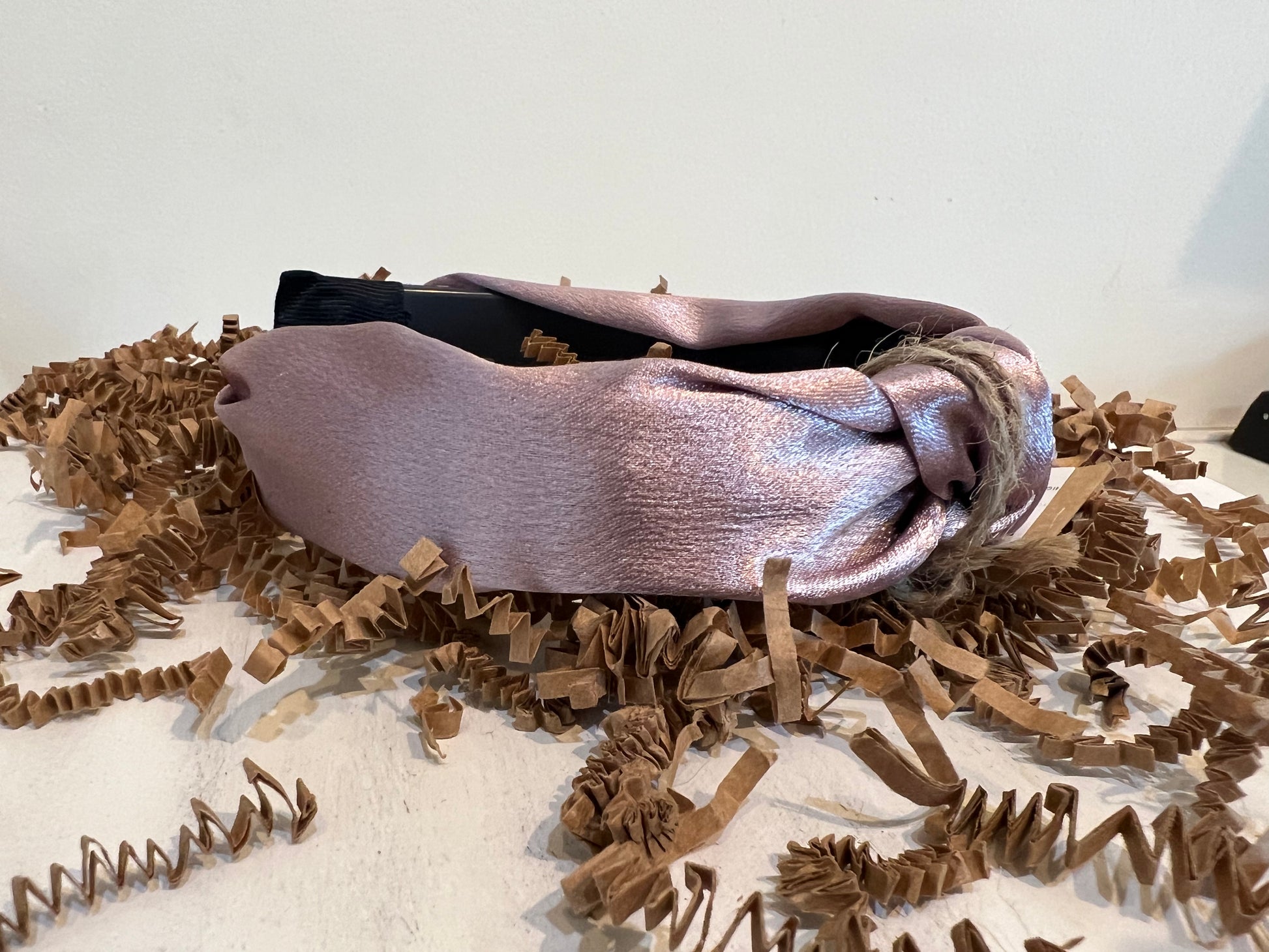 Blush satin headband.