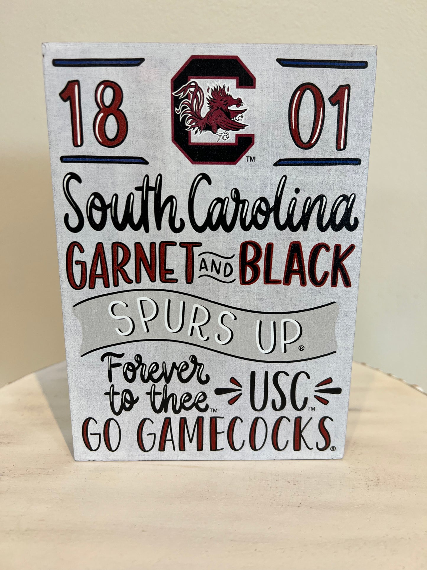 University of South Carolina Collegiate Wooden Sign. "1801; South Carolina; Garnet and Black; Spurs Up; Forever to Thee; USC; Go Gamecocks'.