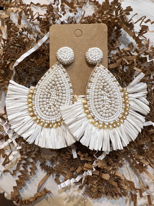 White and gold raffia teardrop beaded earrings.