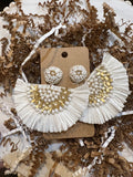 Semi-circle beaded raffia earrings.