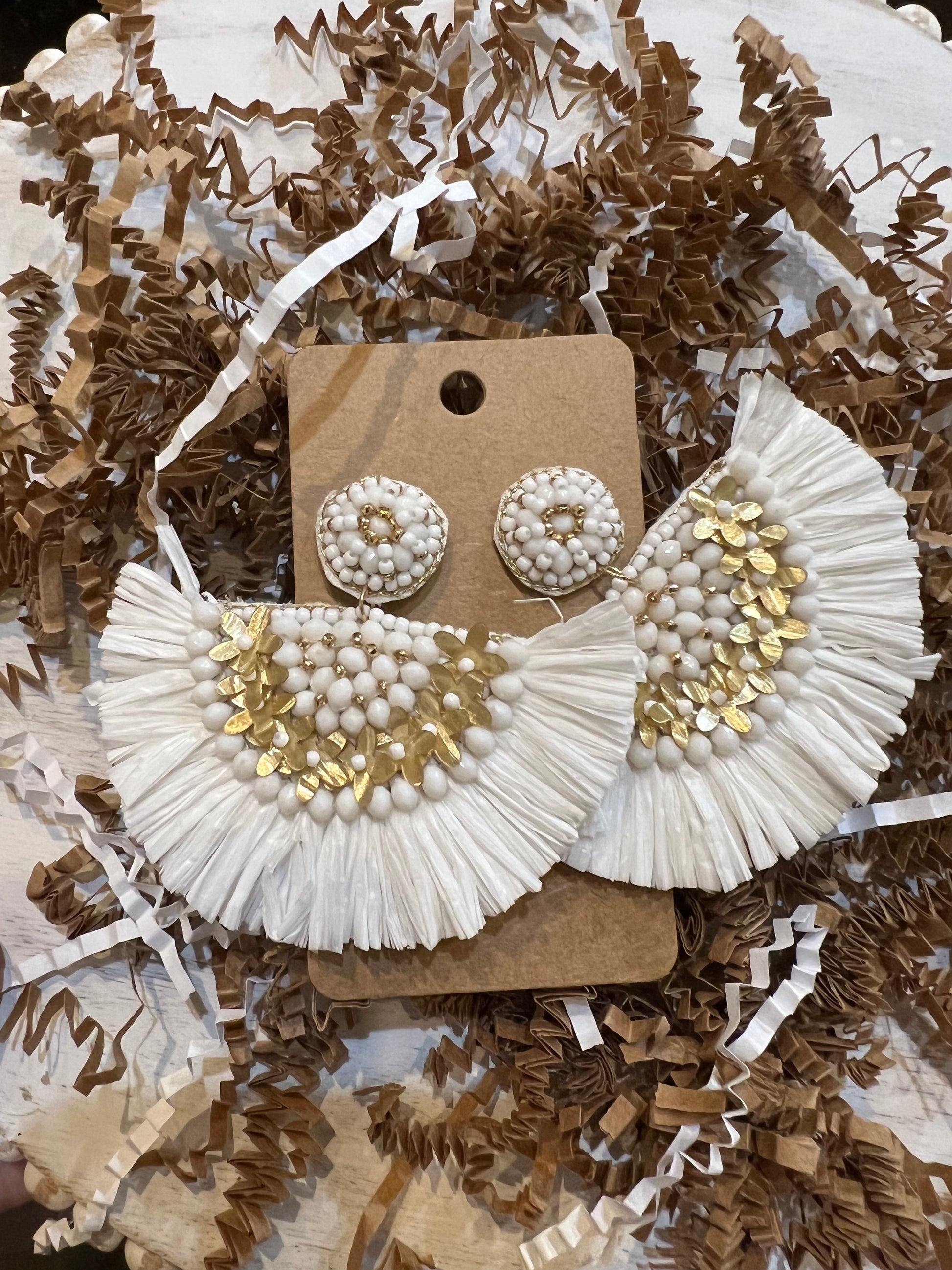 Semi-circle beaded raffia earrings.