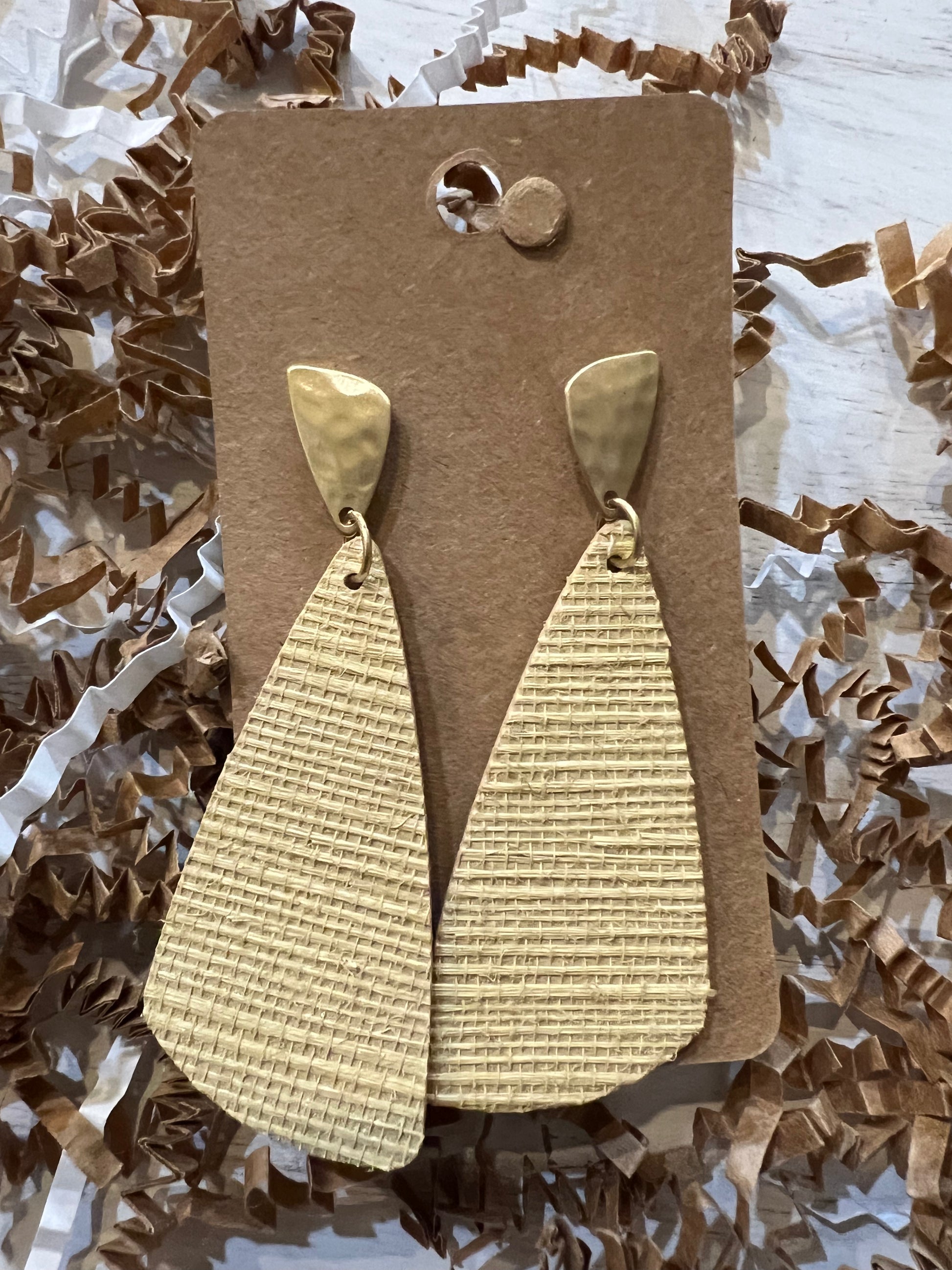 Golden studded dangle earrings with a boho, geometric design.