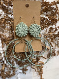 Mint raffia studded round dangle earrings.