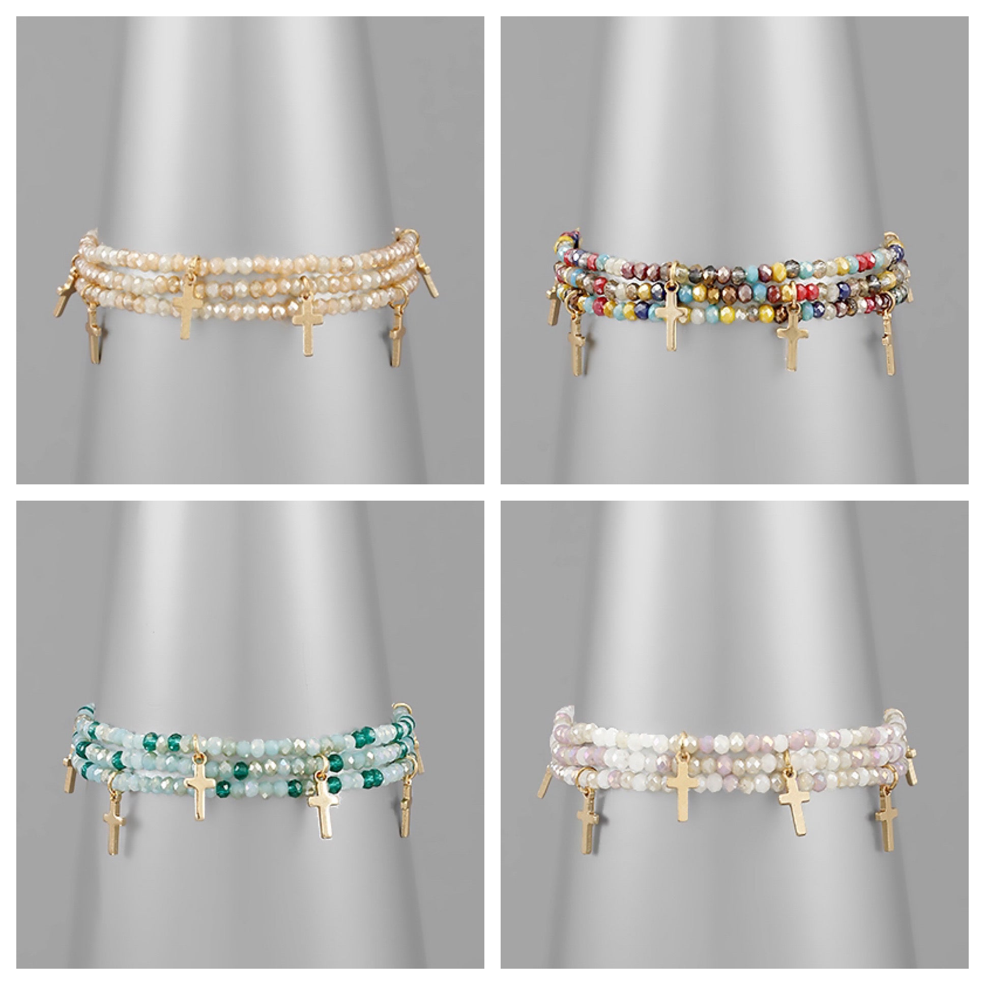 Assorted cross bracelets with cross charms and varying colored beads.