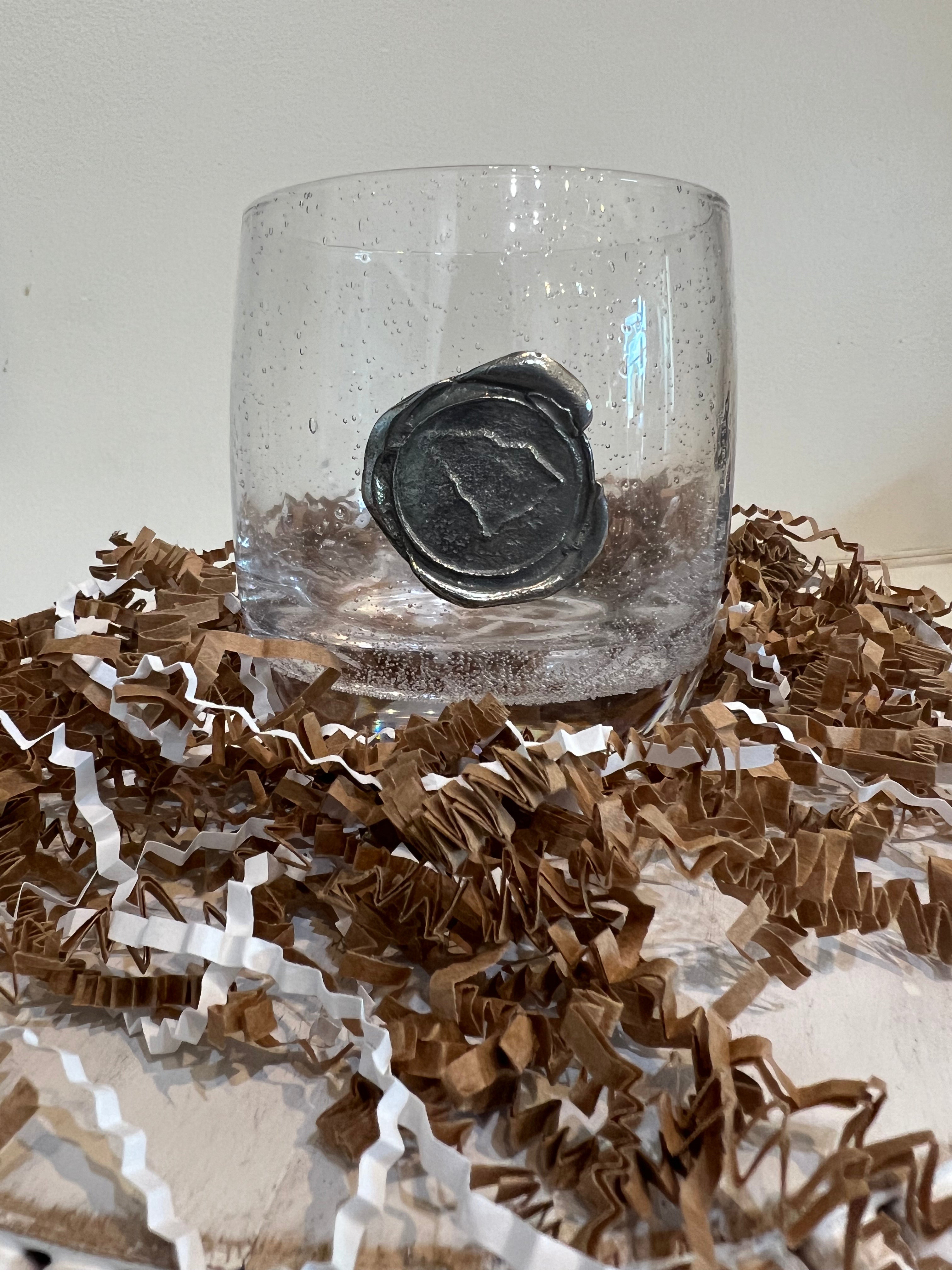 Hand blown drinking glass with custom pewter South Carolina stamp.