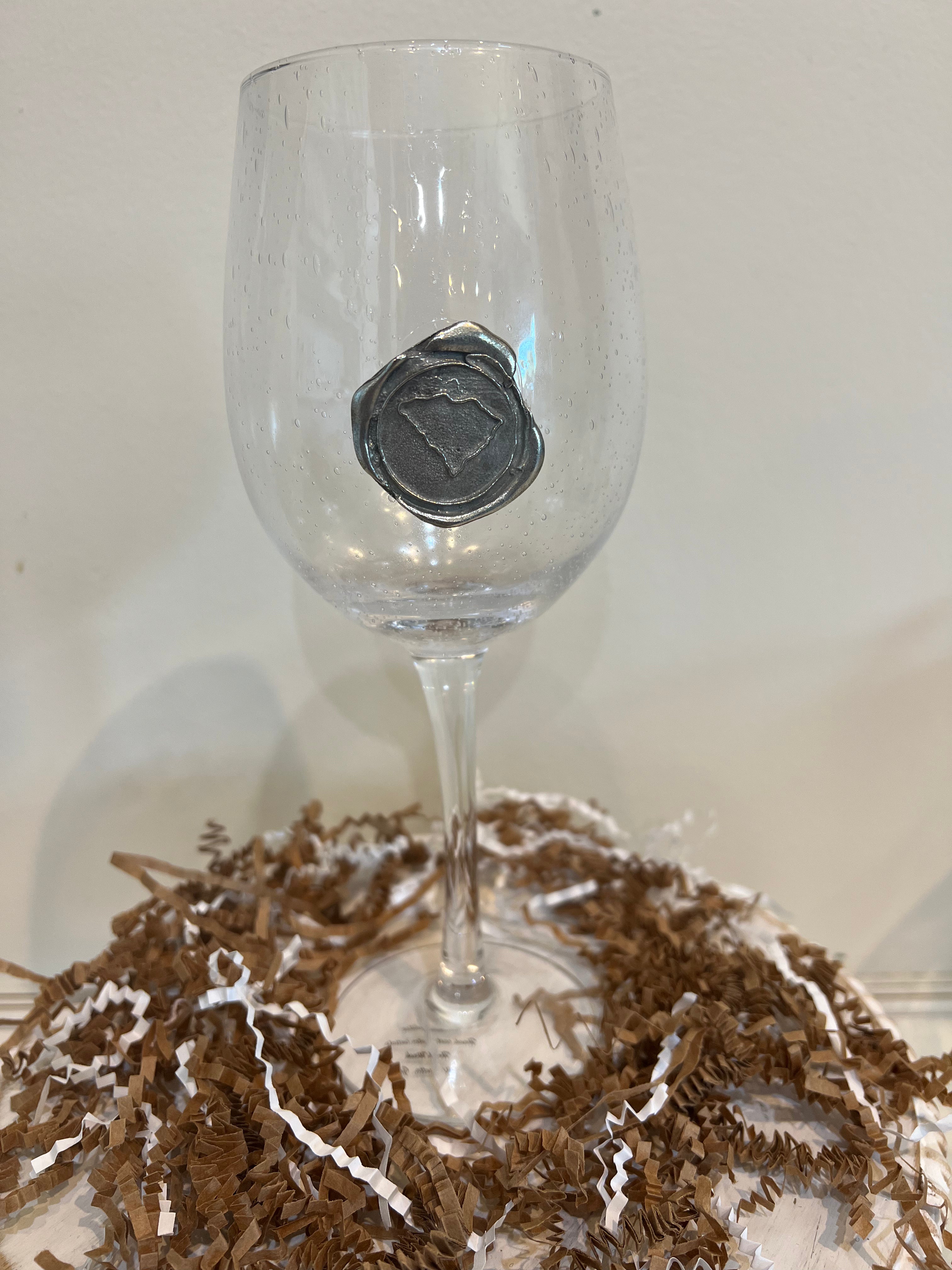 Hand blown drinking glass with custom pewter South Carolina stamp.