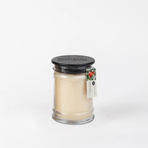 White "Comfort and Joy" 8 oz. holiday jar candle.