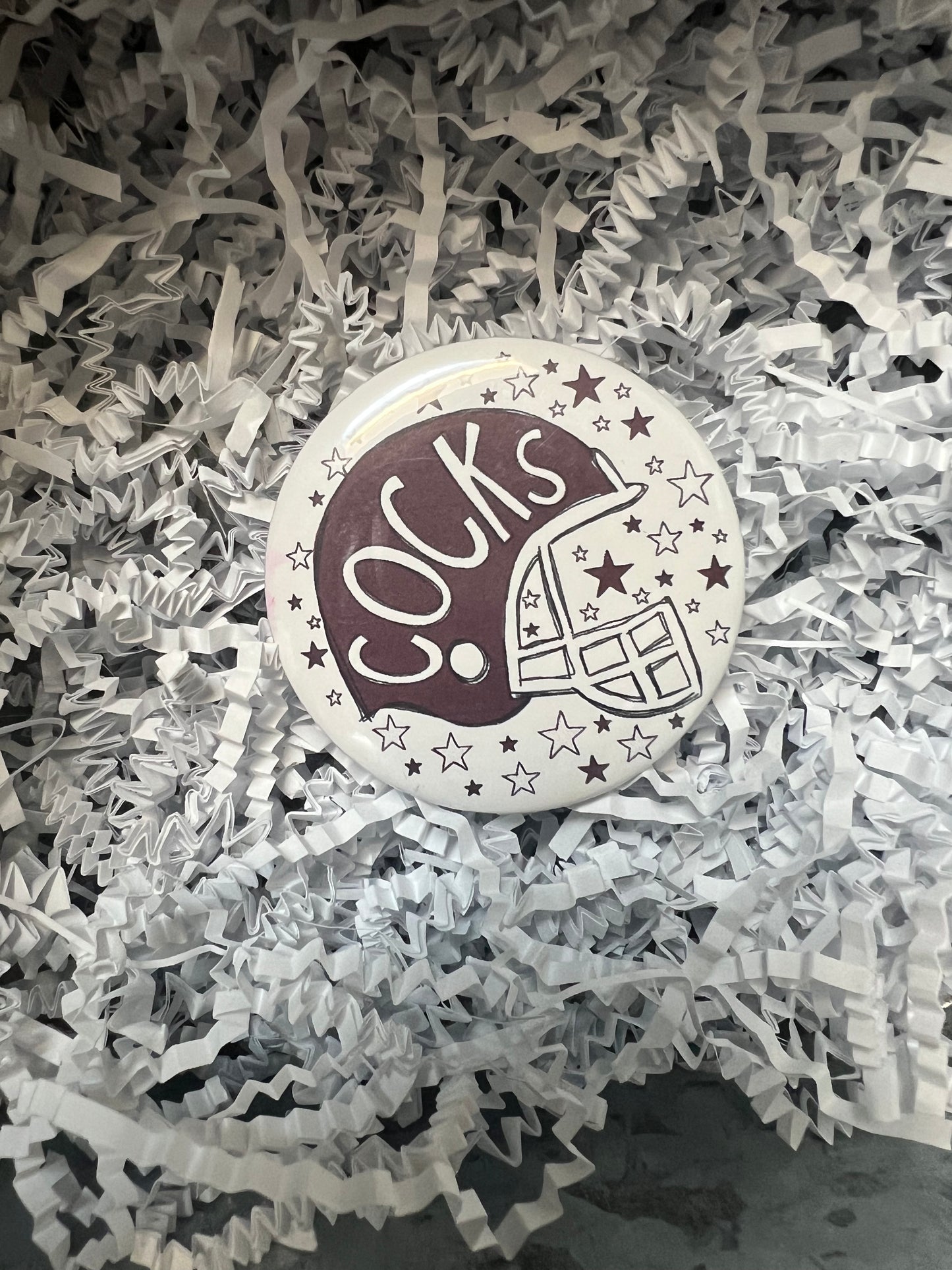 GAMECOCKS Button with stars and a garnet football helmet displaying "COCKS".