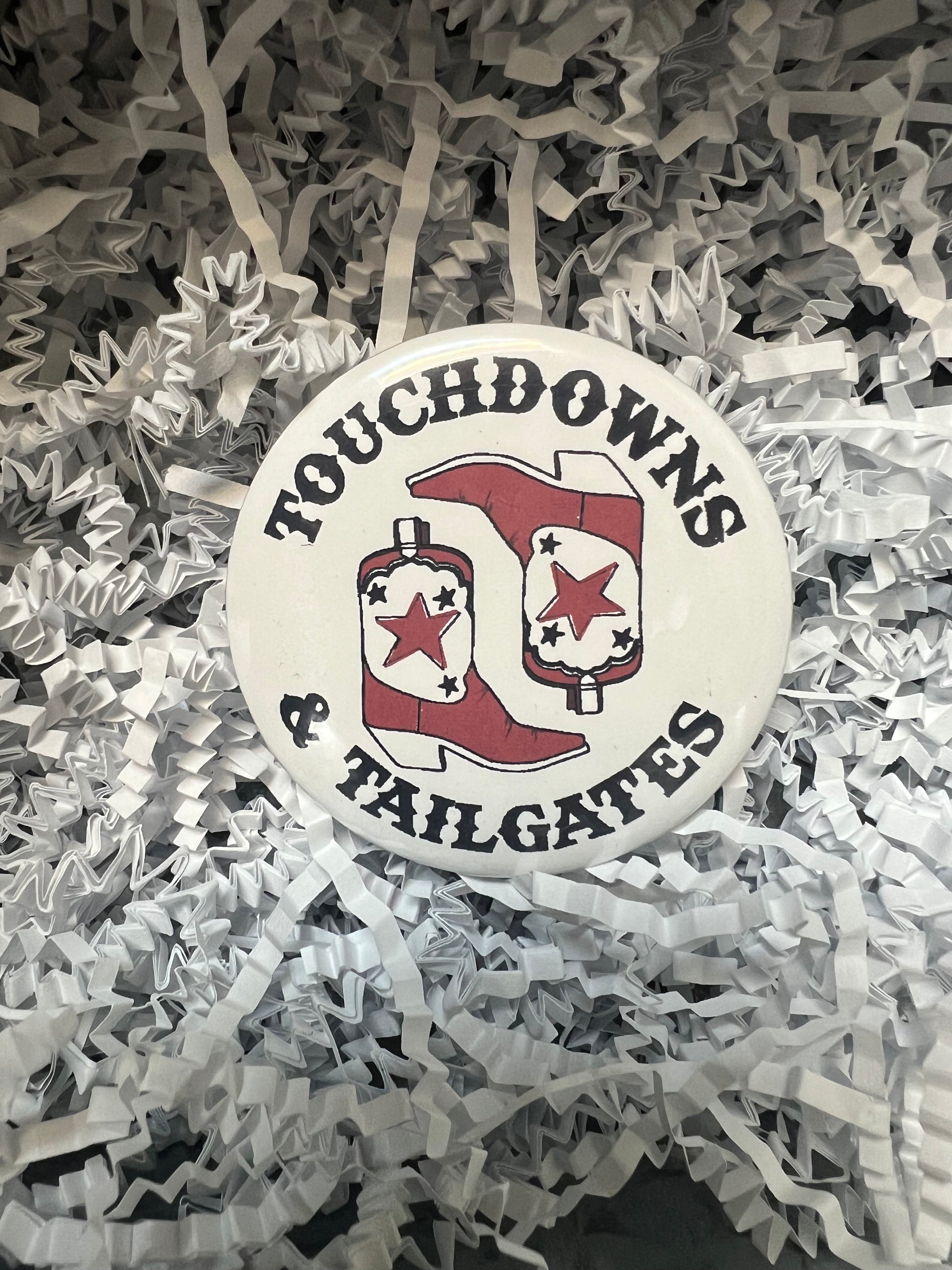 GAMECOCKS Button featuring cowboy boots displaying " Touchdowns & Tailgates".