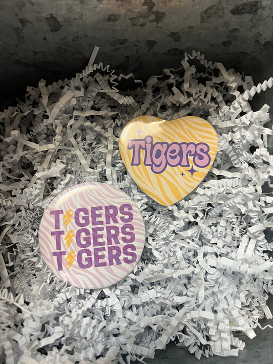 Assorted LSU buttons.