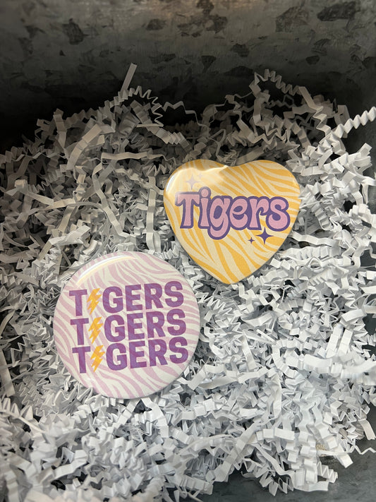Assorted LSU buttons.