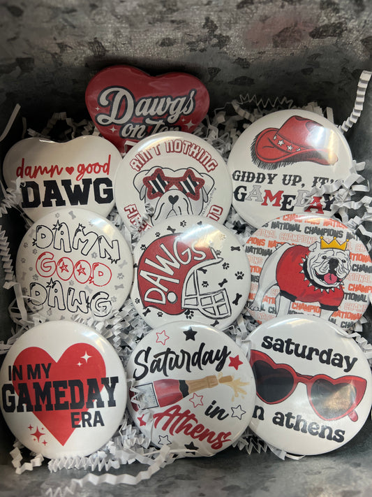 Assorted UGA buttons.