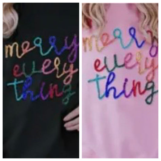 Assorted "Merry Everything" sweaters.