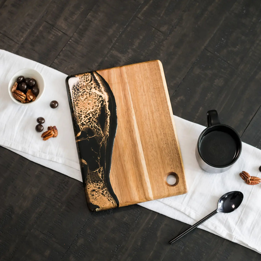 Square black and gold marble dipped board.