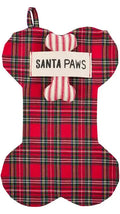 Dog Christmas stocking: red and green plaid with red and white striped bone that says "Santa Paws".