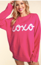 Fuchsia Oversized, long sleeve pullover with "XOXO" in puffy embroidery.