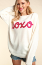 White Oversized, long sleeve pullover with "XOXO" in puffy embroidery.