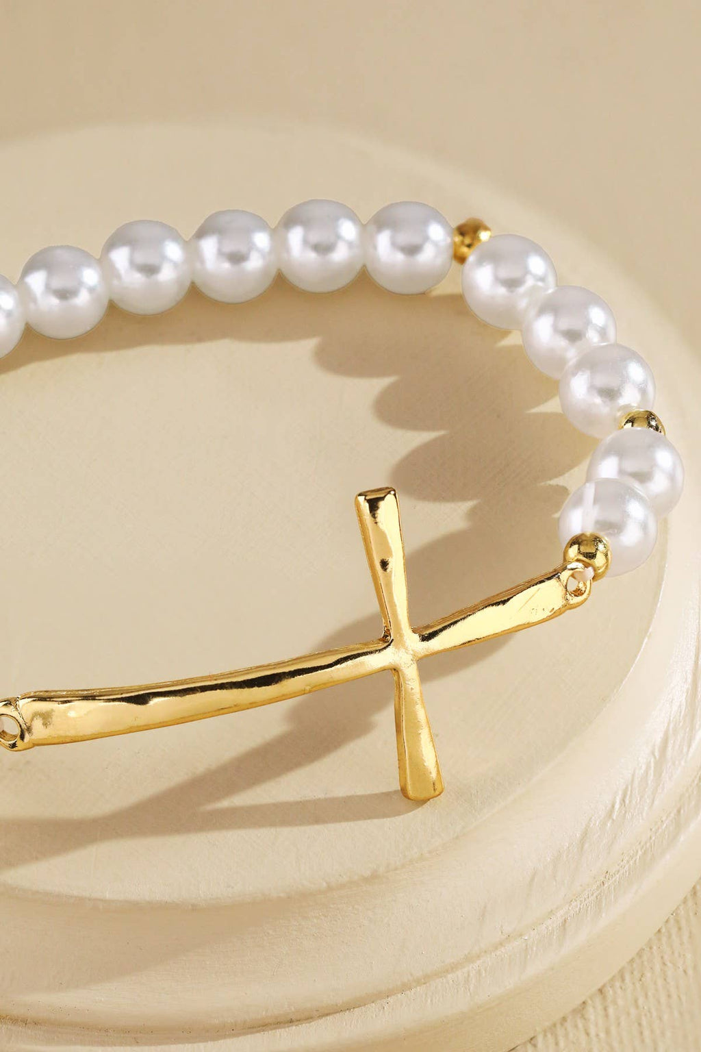 Urbanista - Single Layer Pearl Cross Stretch Bracelet