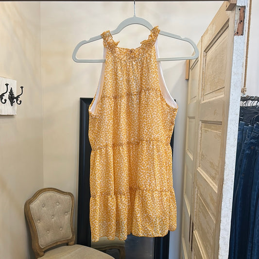 Yellow, floral printed halter tank.