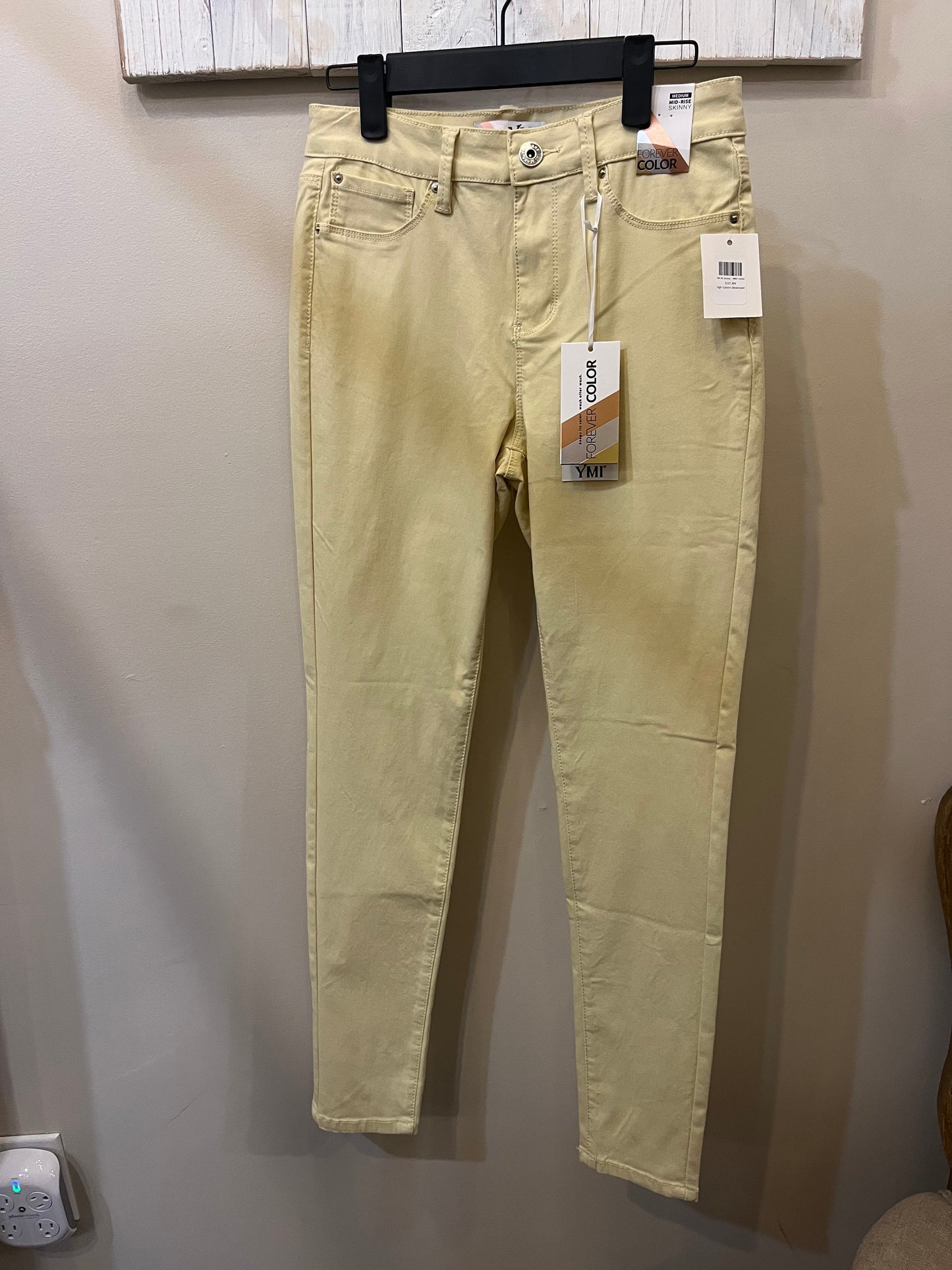 Yellow skinny pants.