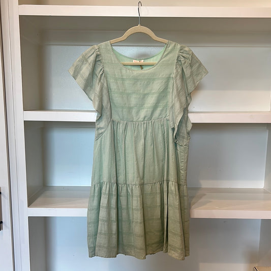 Green lined tiered midi dress with ruffle sleeves.