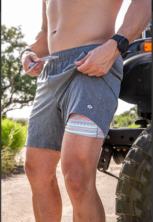 Model featuring Men's Burlebo grizzly grey athletic shorts.