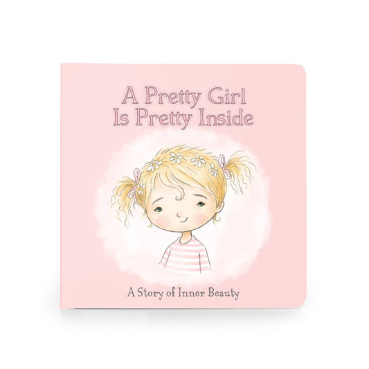 A small book with a pink cover with a young girl with pigtails and flowers in her hair that says "A Pretty Girl Is Pretty Inside".
